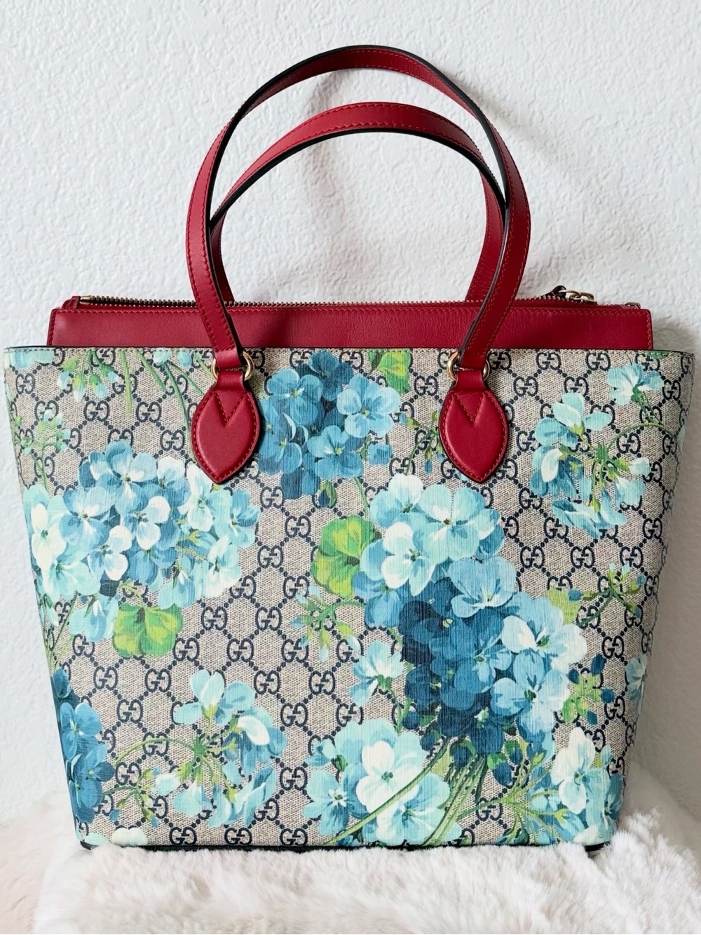 Gucci Blooms GG Supreme Tote Bag
Blue Floral Print with Red Leather Trim